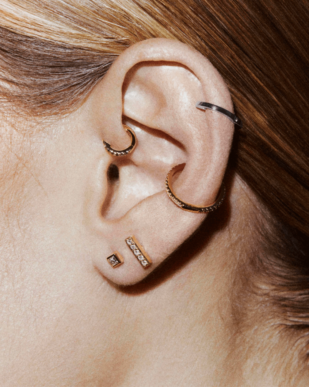 Gemini hoop 11mm in 14k yellow & white gold, detail view.
