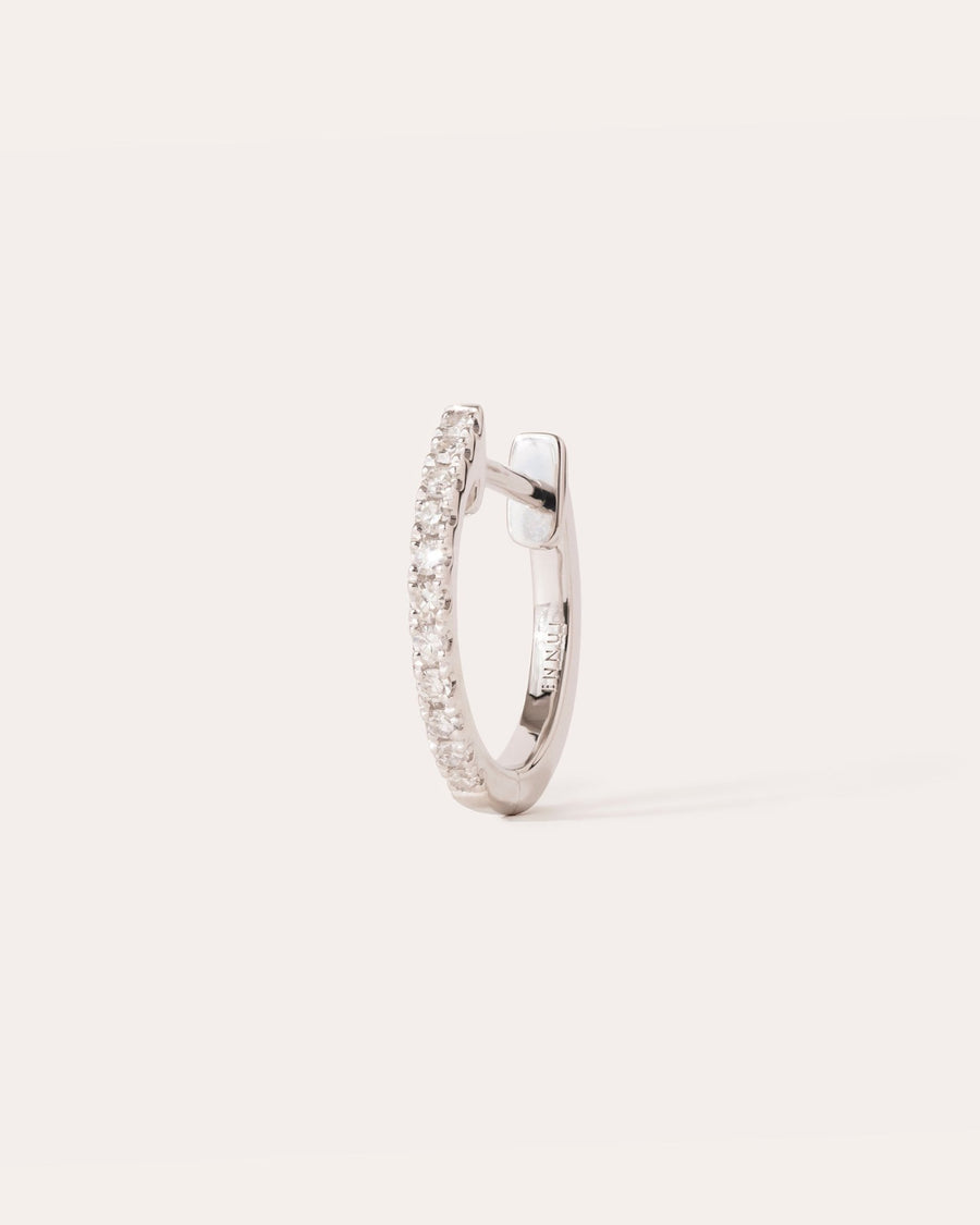 Diamond hoop 12mm in 14k white gold, set with a natural diamond.