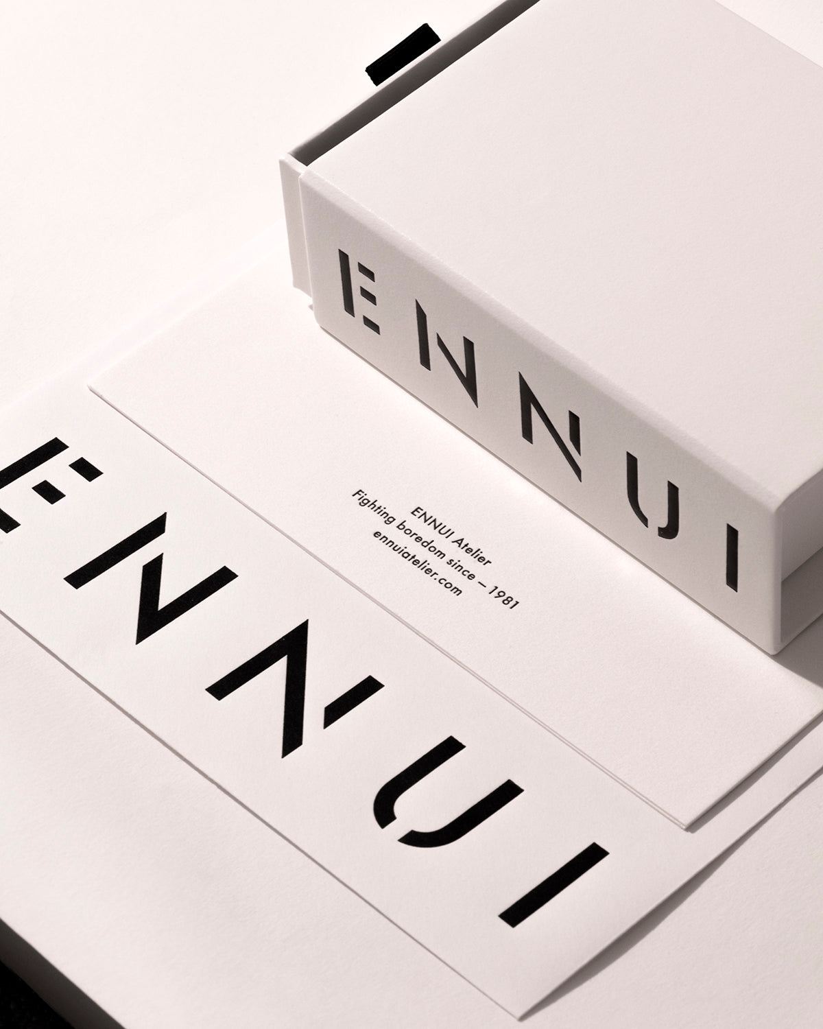 Black ENNUI jewelry box packaging for premium piercing jewelry