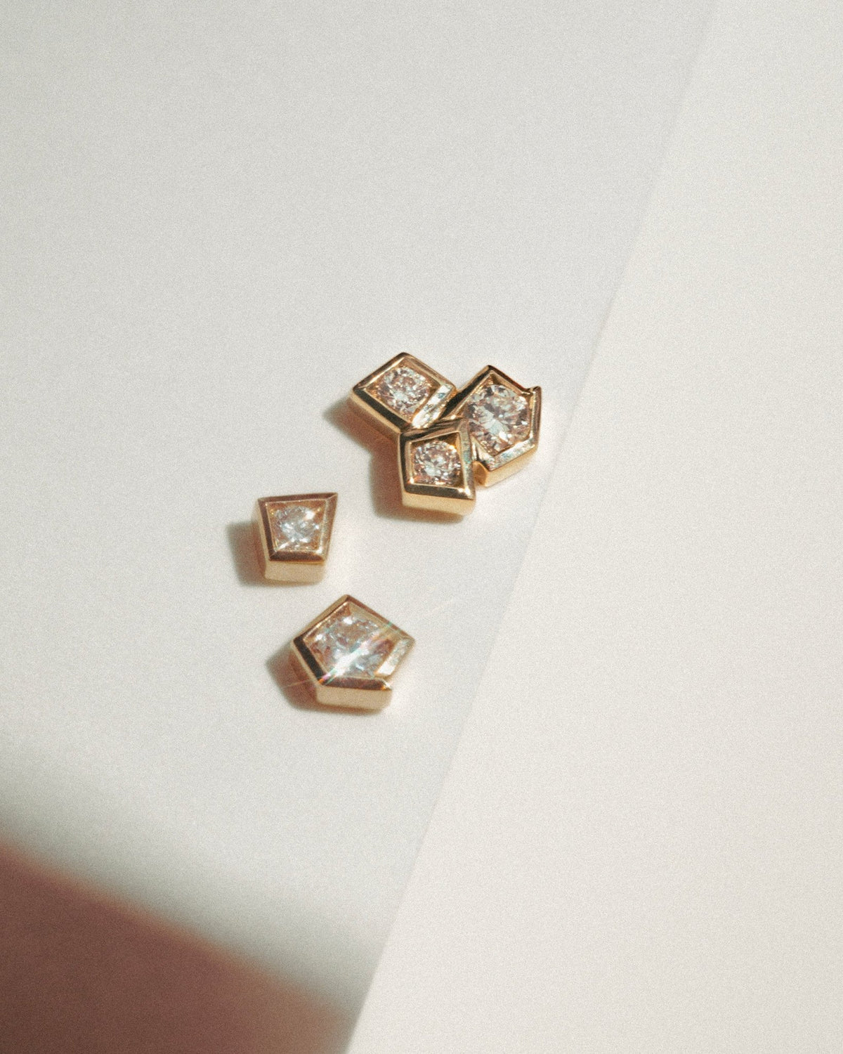 Triptych labret in 14k white gold, detail view.