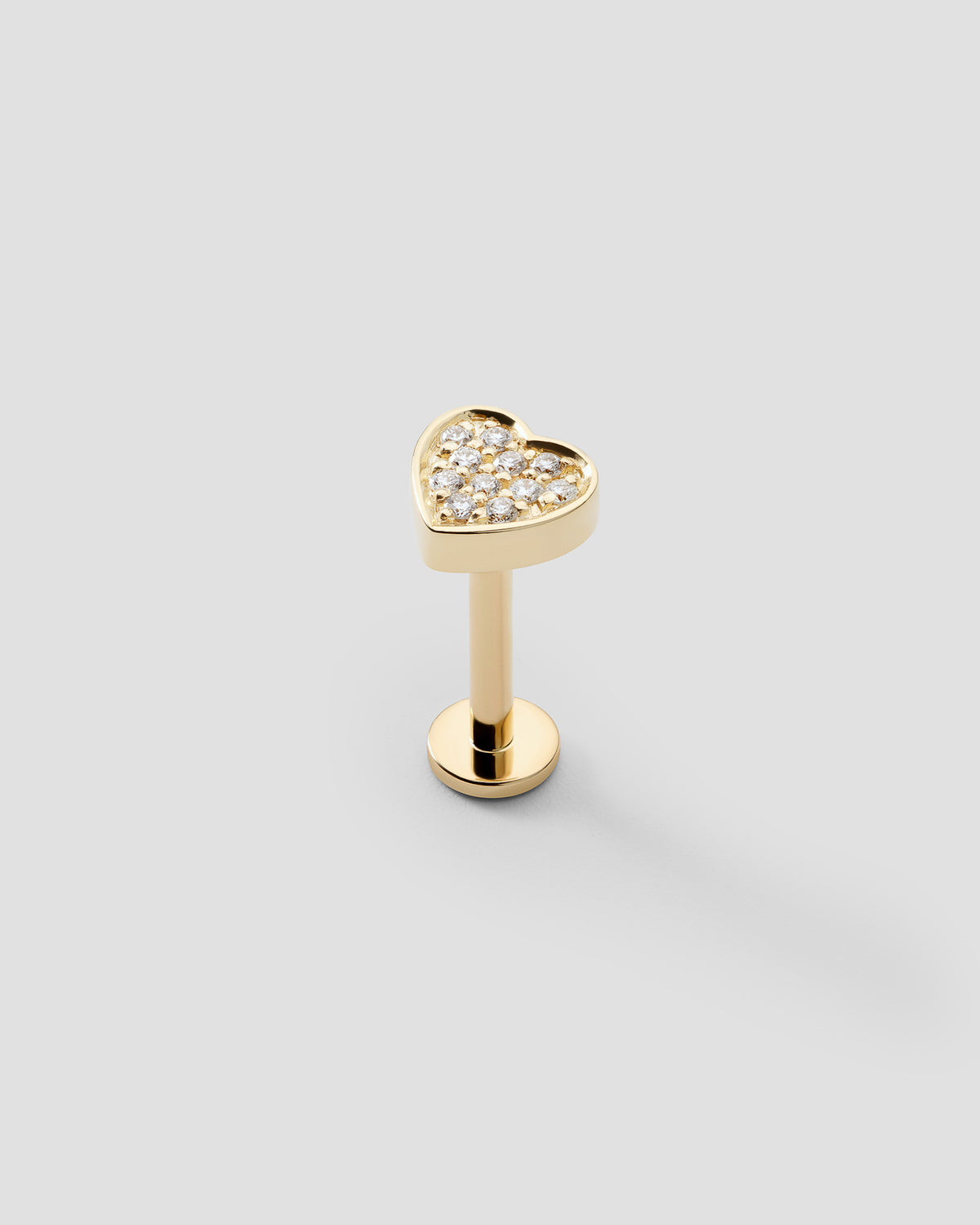 Ephyra pavé labret in 14k yellow gold, set with natural diamonds, detail view.