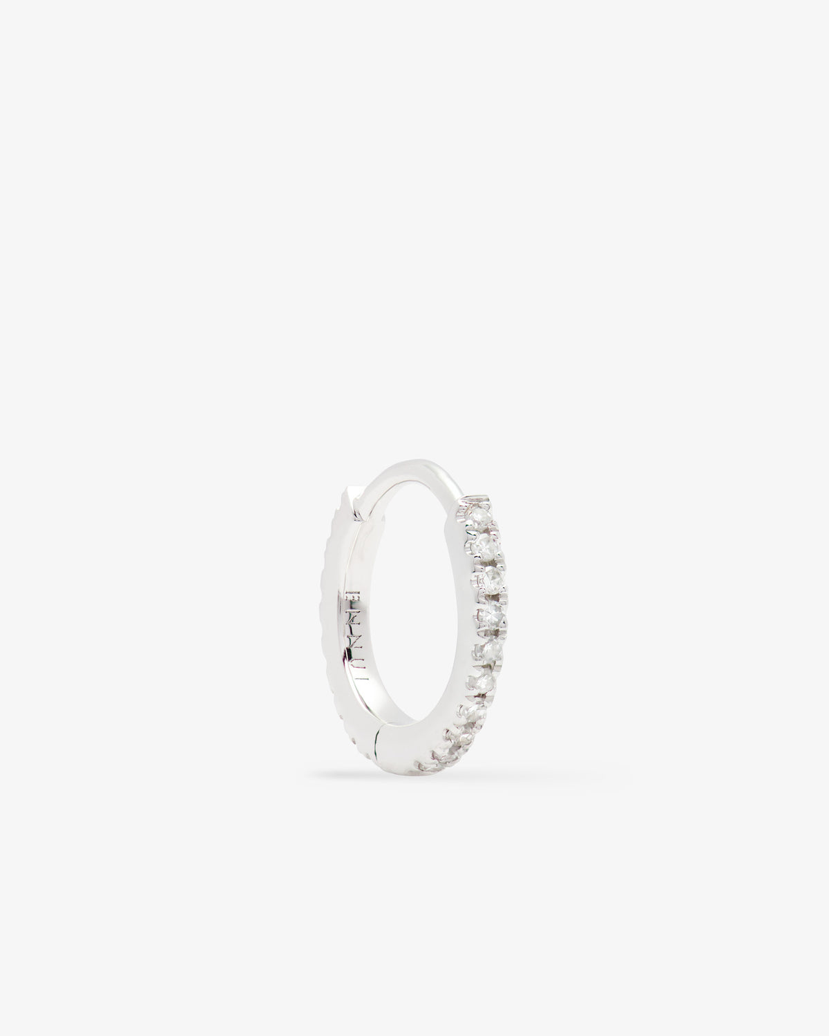 Repos huggie in 14k white gold, 9 mm, back view.
