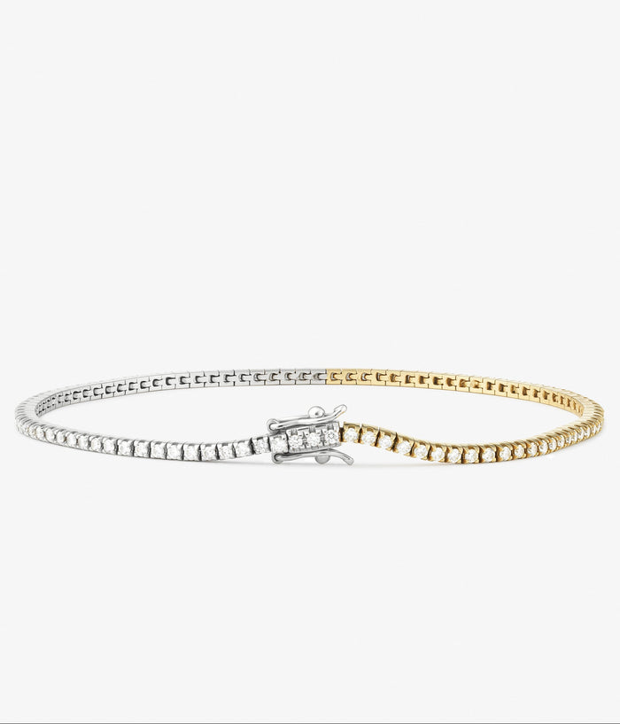 Gaia bracelet in 18k yellow & white gold, set with a natural diamond.