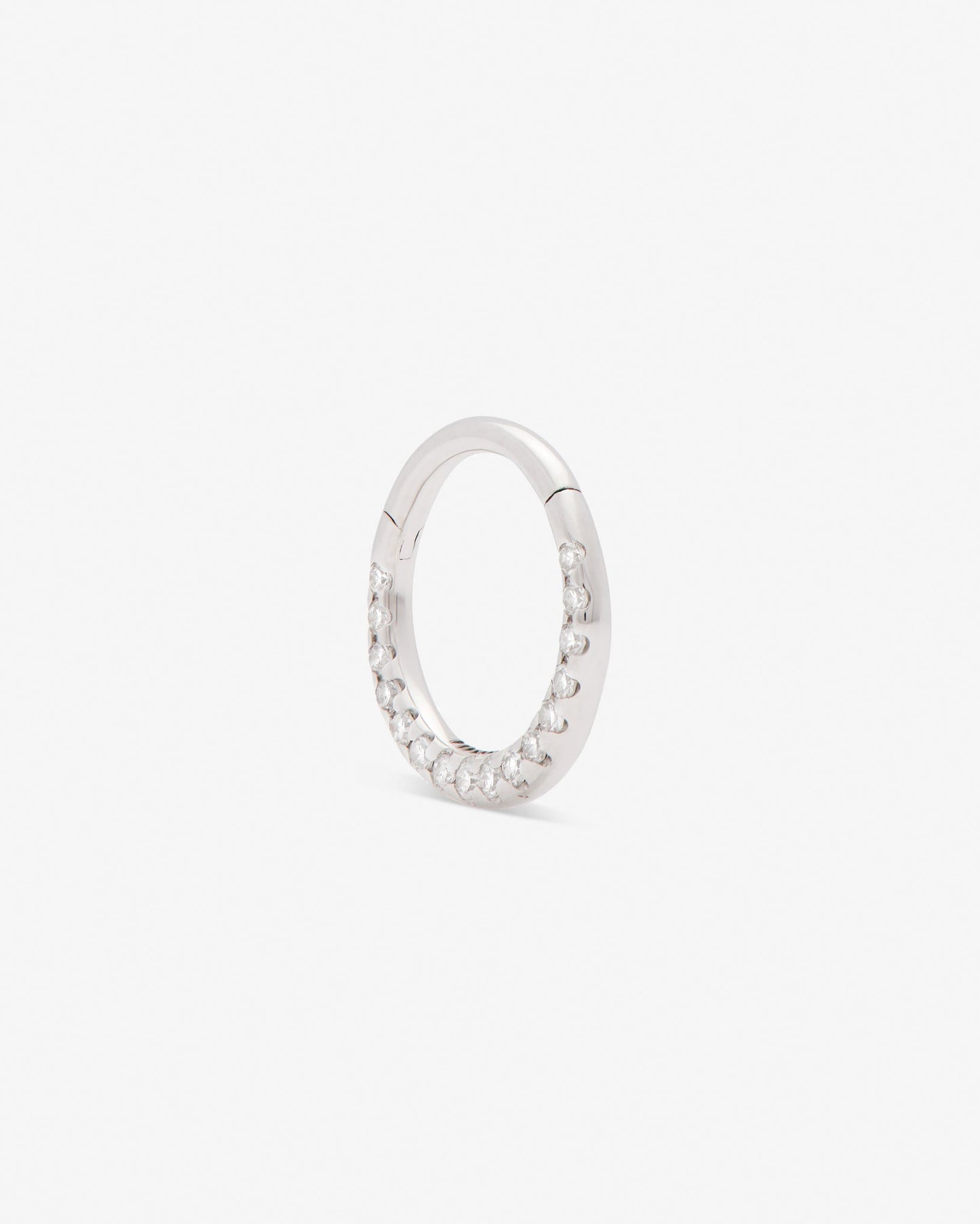 septum huggie with white diamonds set in white gold from side