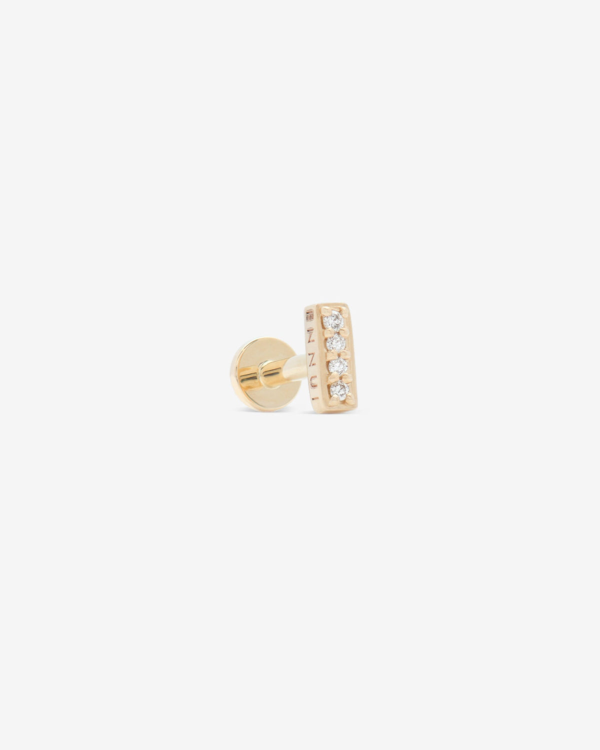 Avant labret in 14k yellow gold, detail view.