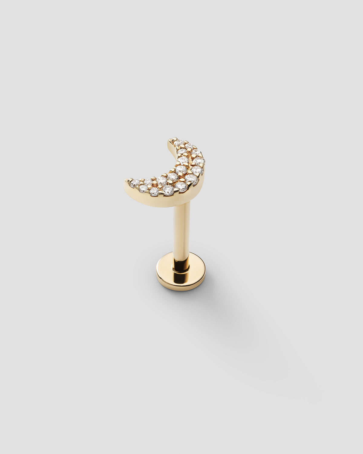 Luna labret in 14k yellow gold, detail view.