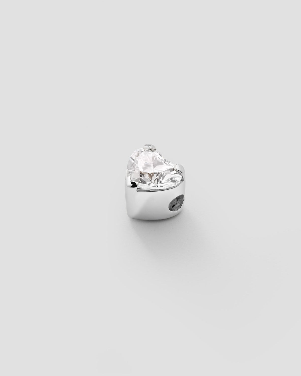 Erosia necklace with a 14k white gold charm on an 18k white gold chain, detail view.