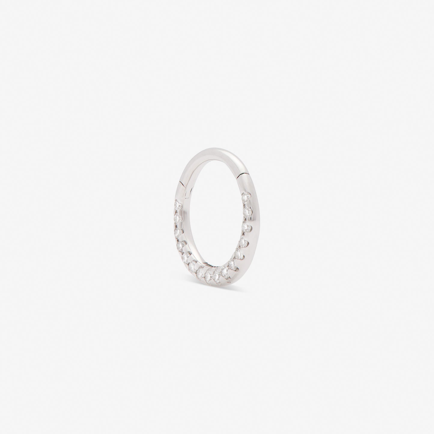 septum huggie with white diamonds set in white gold from side