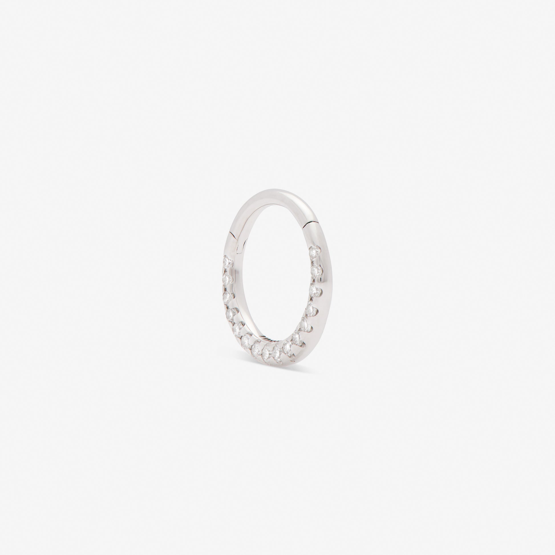 septum huggie with white diamonds set in white gold from side