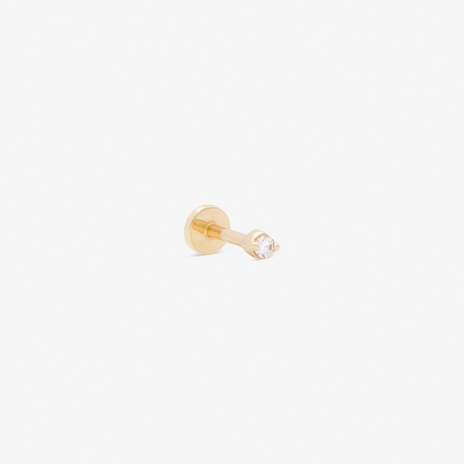 ivory labret in yellow gold from side